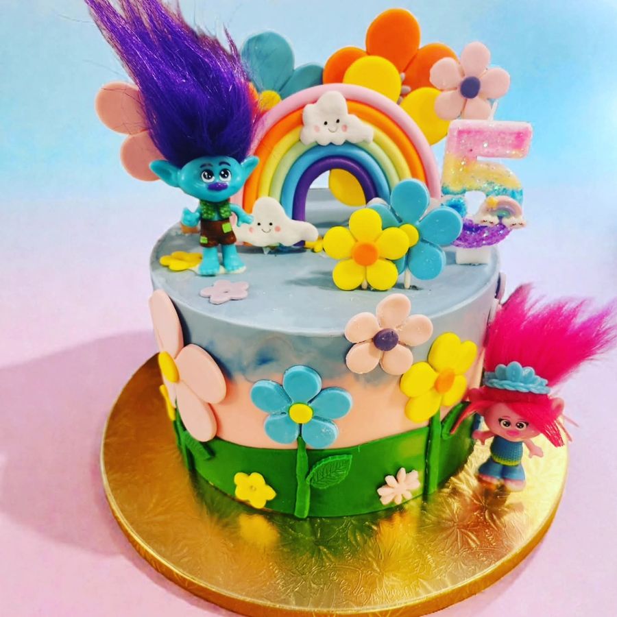 Trolls themed rainbow birthday cake with fondant flowers and a number 5